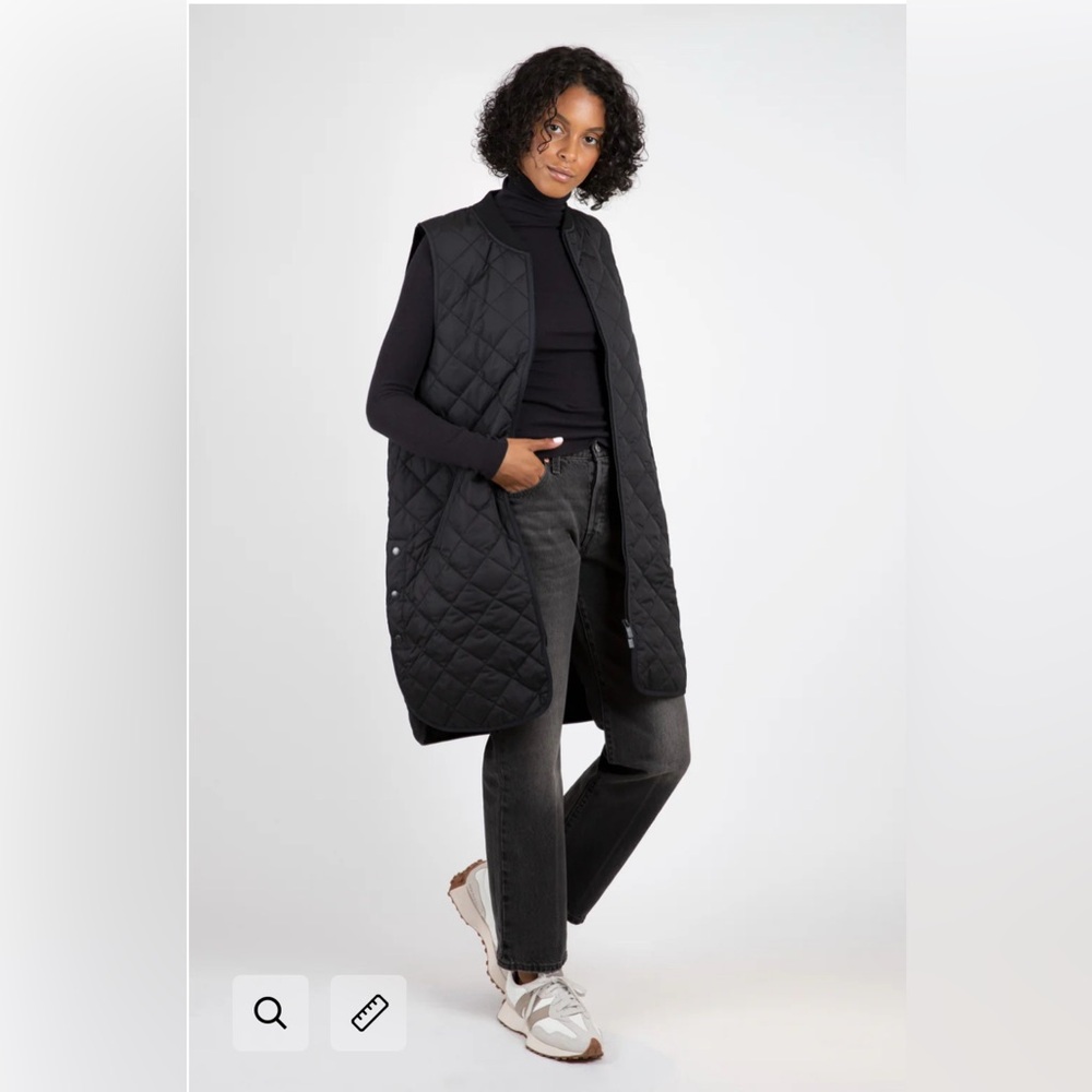 Quilted navy blue long vest with pockets and side buttons